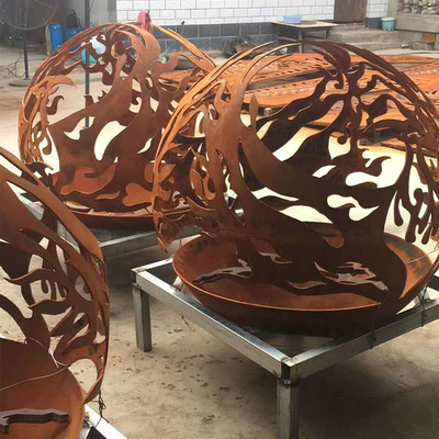 Phoenix Pattern Steel Fire Pit Outdoor Patio Corten Sphere Firepit Untuk Pemanasan Taman